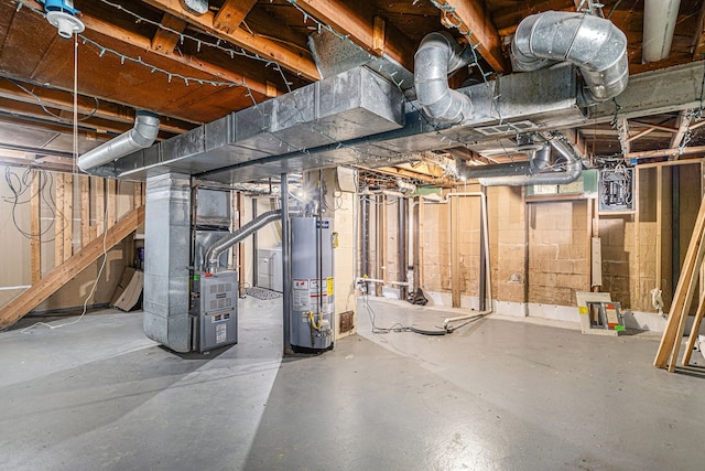 basement featuring heating unit and water heater