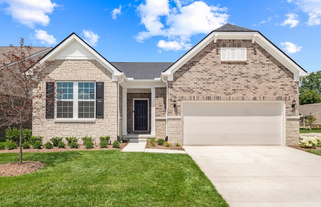 view of front of property featuring a garage and a front lawn