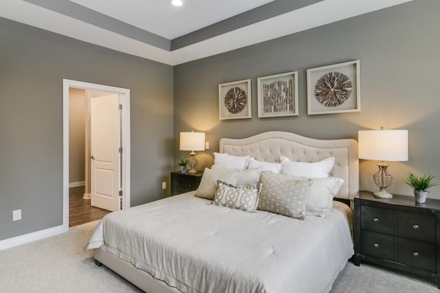 bedroom with light colored carpet