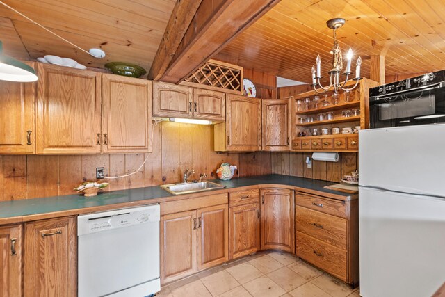 8918 W School Section Lake Dr, Mecosta, MI 49332 - kitchen with dishwasher, a sink, wooden walls, wood ceiling with exposed beams, and dark countertops