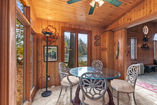 8918 W School Section Lake Dr, Mecosta, MI 49332 - dining area featuring wood walls, a ceiling fan, and wooden ceiling