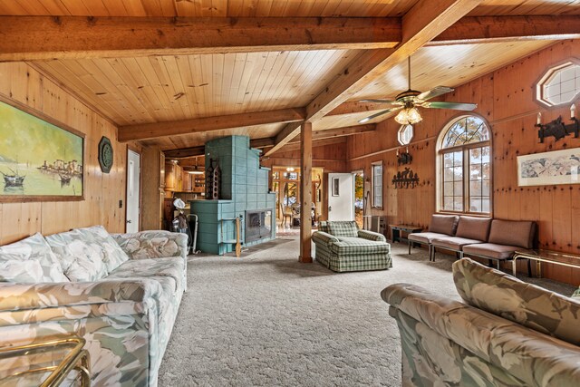 8918 W School Section Lake Dr, Mecosta, MI 49332 - living room featuring wood walls, carpet floors, wood ceiling, and a ceiling fan