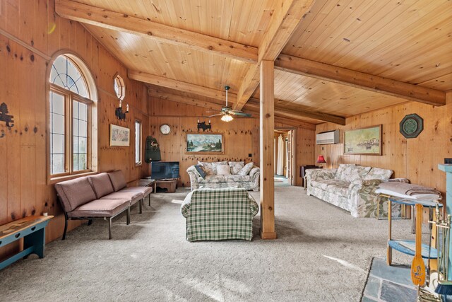 8918 W School Section Lake Dr, Mecosta, MI 49332 - living area featuring carpet flooring, wooden walls, wooden ceiling, and a ceiling fan