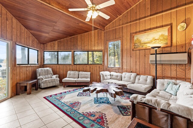 8918 W School Section Lake Dr, Mecosta, MI 49332 - living room with vaulted ceiling, healthy amount of natural light, light tile patterned floors, wooden ceiling, and wood walls