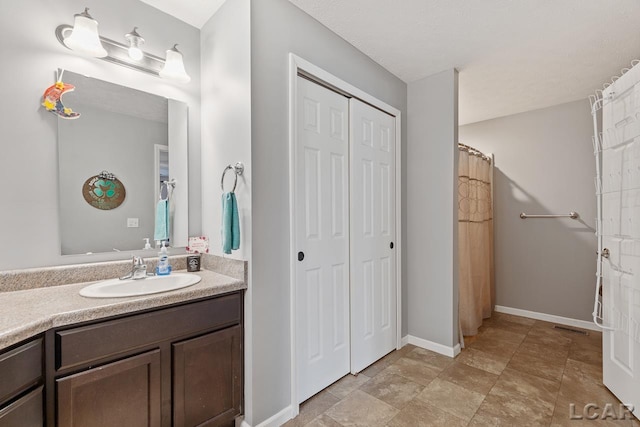 bathroom featuring vanity