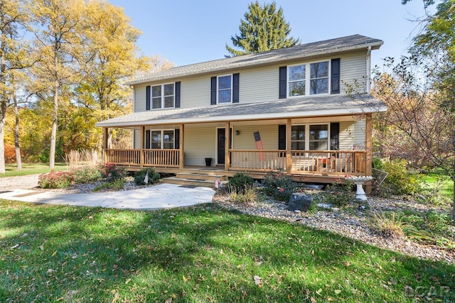 view of front facade featuring a front lawn and a porch