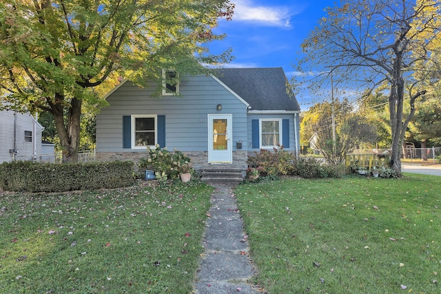 view of front of property with a front lawn