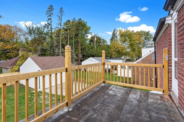 wooden deck with a yard