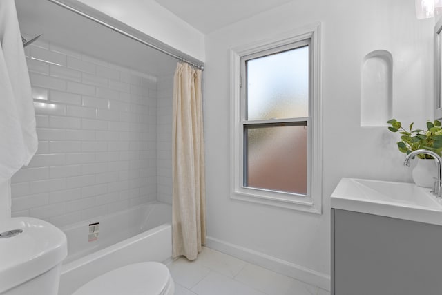 full bathroom featuring tile patterned flooring, vanity, toilet, and shower / tub combo with curtain