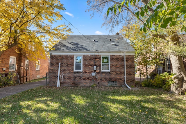 exterior space featuring a lawn