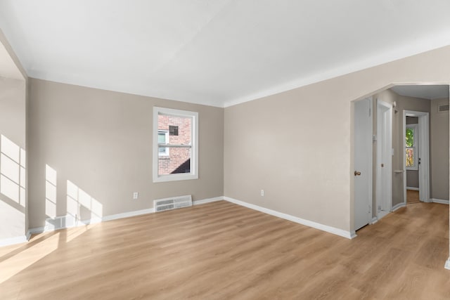 unfurnished living room with light hardwood / wood-style floors