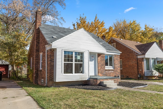 view of front of property featuring a front yard