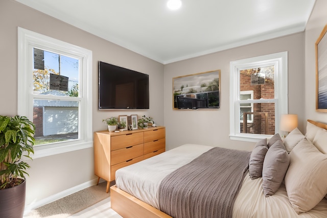 bedroom with light colored carpet