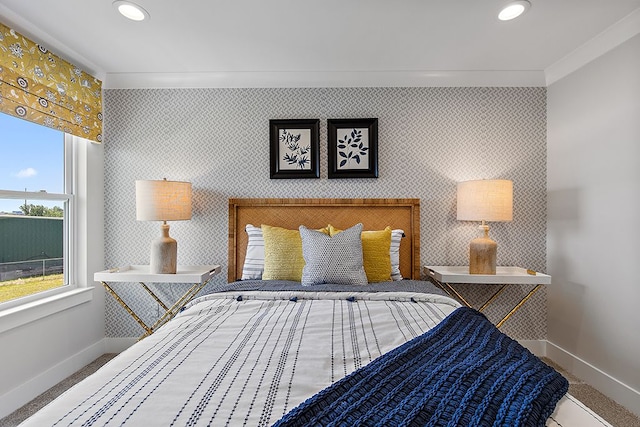 carpeted bedroom with ornamental molding