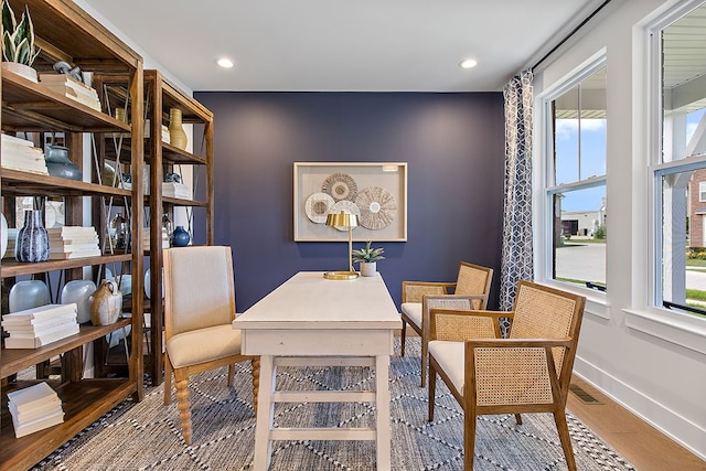 sitting room with hardwood / wood-style floors