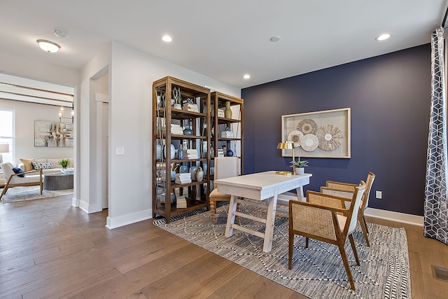 office space with hardwood / wood-style floors