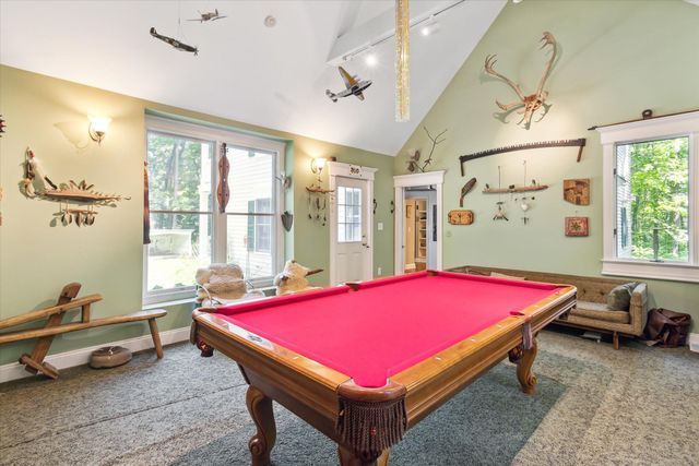 playroom with plenty of natural light, rail lighting, and pool table