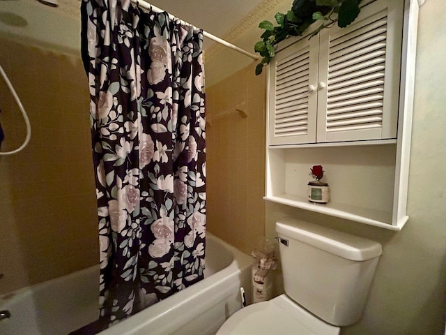 full bath featuring shower / bath combo with shower curtain and toilet