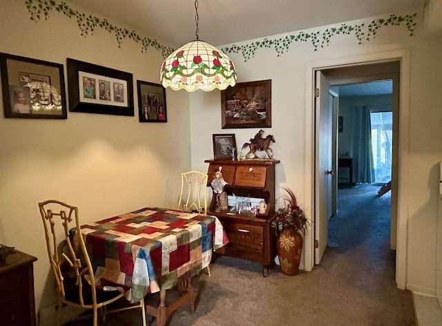 view of carpeted dining space