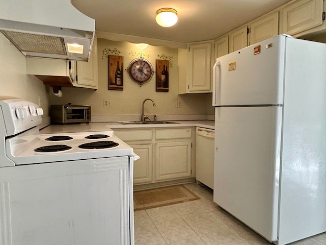 kitchen featuring white appliances, a toaster, light countertops, under cabinet range hood, and a sink