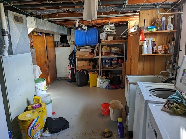 basement with independent washer and dryer