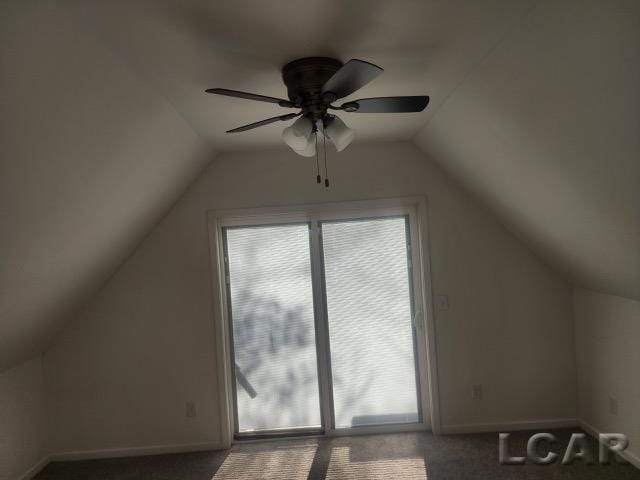 bonus room featuring carpet floors, lofted ceiling, and baseboards