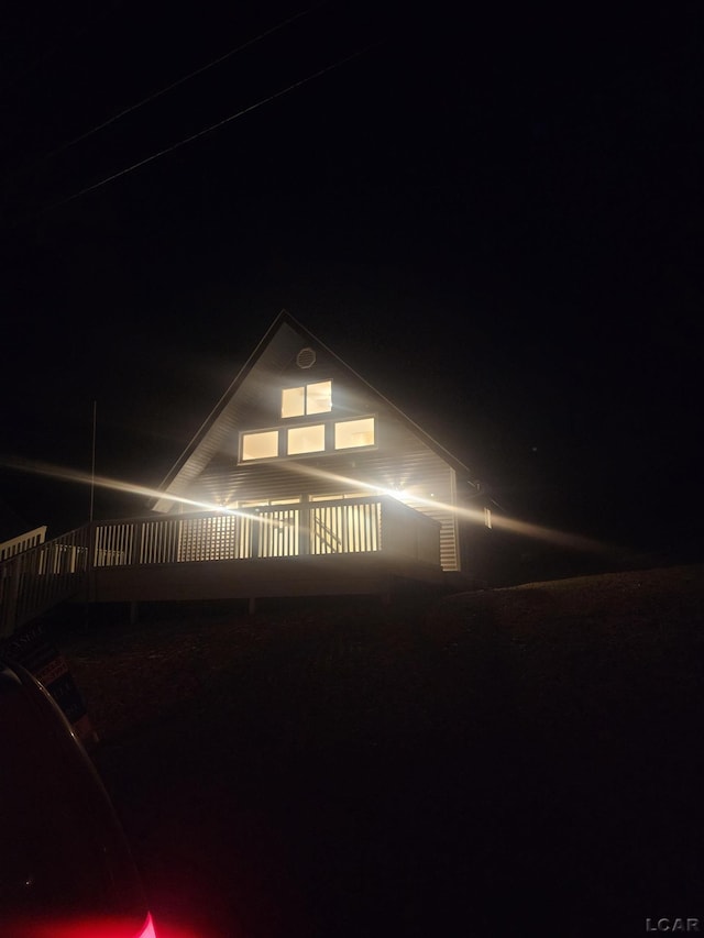 view of property exterior at twilight