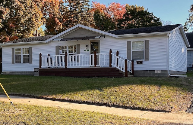 view of front of home with a front lawn and a porch