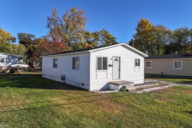 view of front of house with a front yard