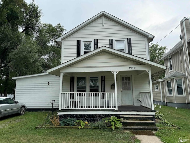 view of front of property featuring covered porch