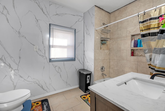 full bathroom with vanity, toilet, tile patterned flooring, and shower / tub combo