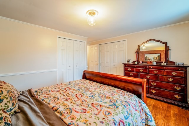 bedroom with light hardwood / wood-style flooring and ornamental molding