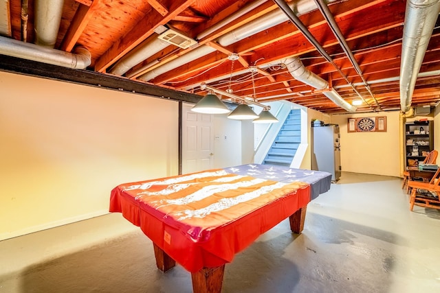 playroom with concrete flooring and pool table