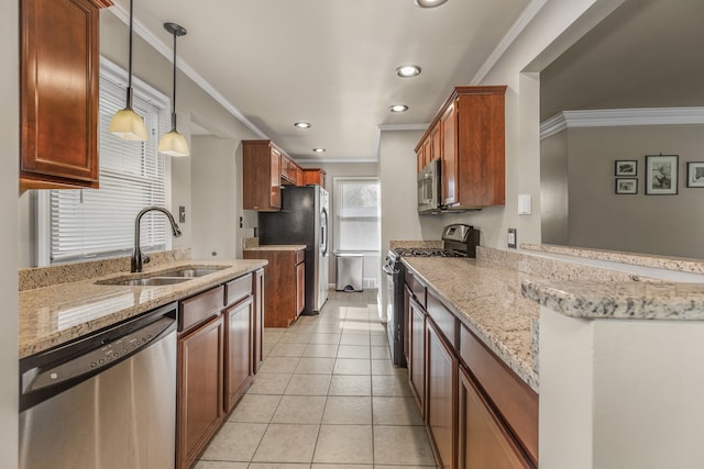 kitchen with sink, appliances with stainless steel finishes, ornamental molding, light tile patterned flooring, and decorative light fixtures