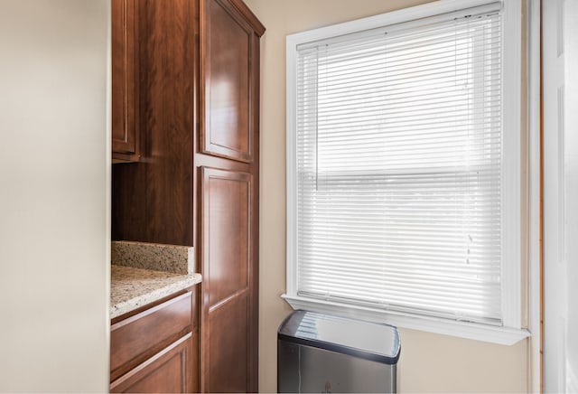 kitchen featuring light stone countertops