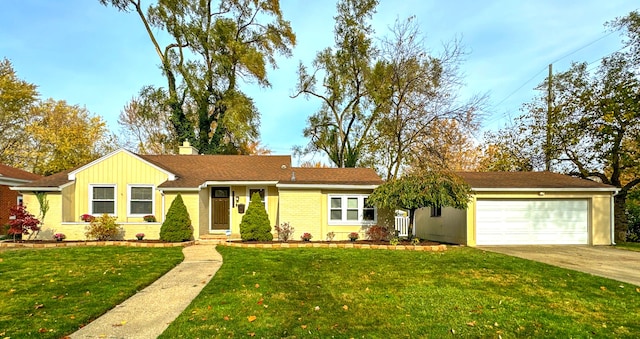 ranch-style home featuring a garage and a front yard