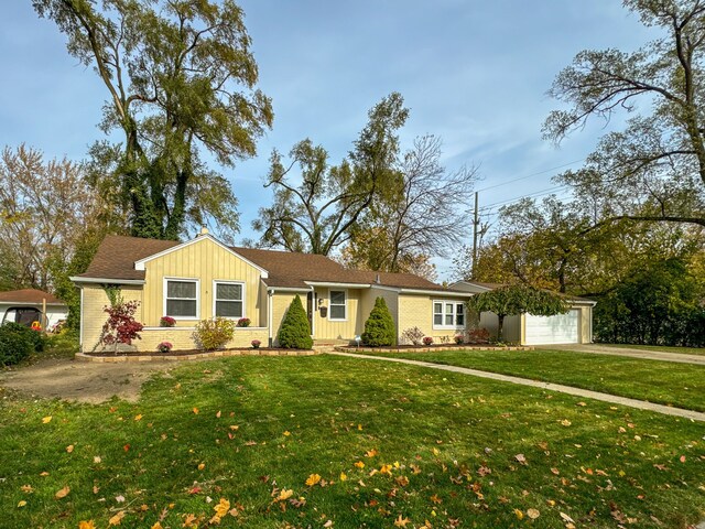 ranch-style home with a garage and a front yard