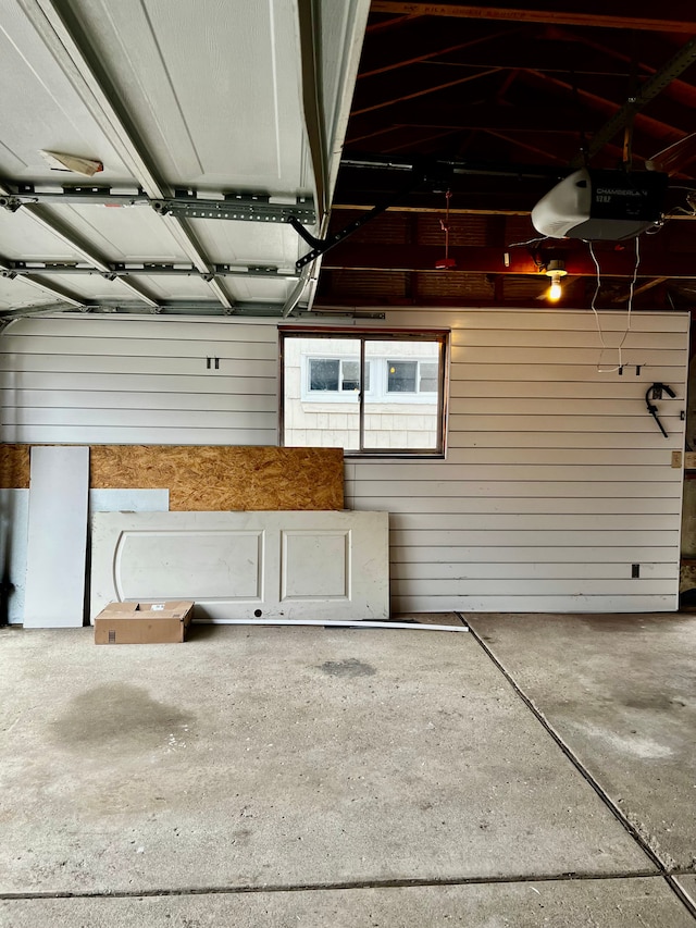 garage featuring a garage door opener