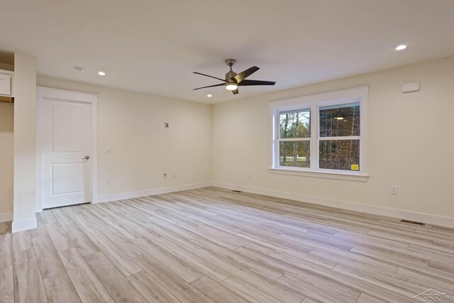 2210 Fox Run Rd, West Branch, MI 48661 - unfurnished room featuring light wood-style flooring, a ceiling fan, recessed lighting, and baseboards