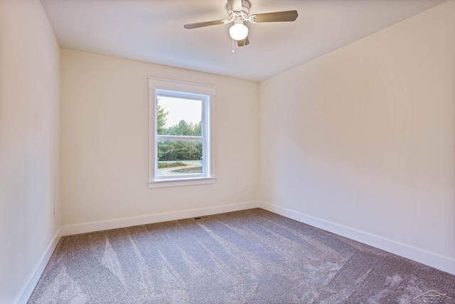 carpeted empty room with ceiling fan