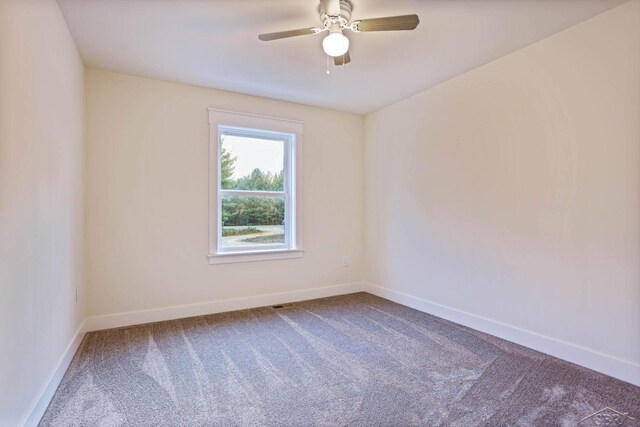 2210 Fox Run Rd, West Branch, MI 48661 - unfurnished room featuring carpet, baseboards, and ceiling fan