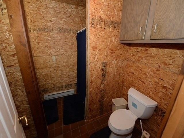 bathroom featuring toilet