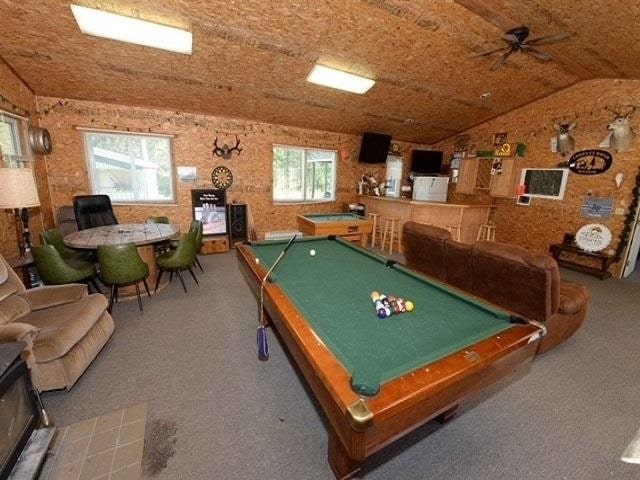 rec room featuring carpet flooring, ceiling fan, lofted ceiling, and pool table