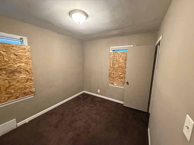 view of carpeted spare room