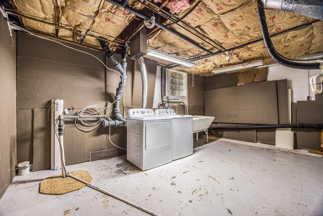 laundry area with washing machine and dryer