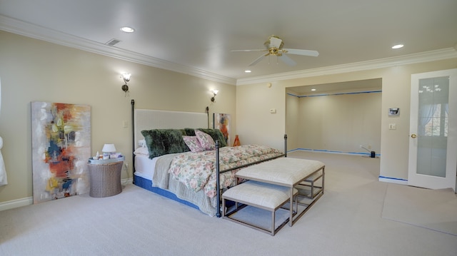 bedroom featuring ceiling fan, crown molding, and light colored carpet