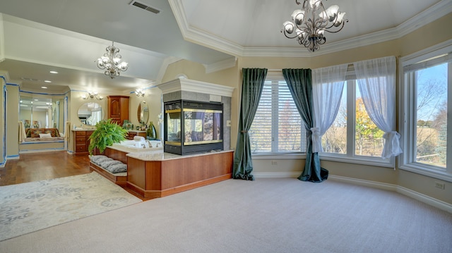 interior space with a chandelier and a multi sided fireplace