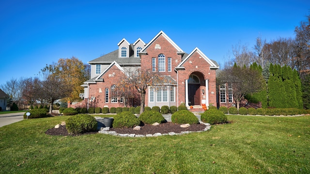 front of property featuring a front lawn