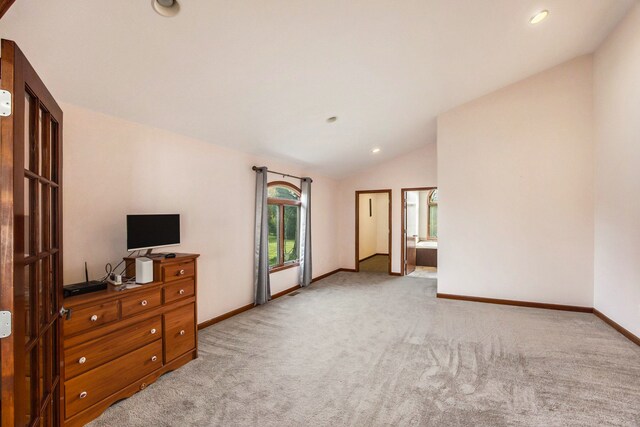 6700 Bethuy Rd, Ira, MI 48023 - unfurnished living room with vaulted ceiling, light colored carpet, baseboards, and recessed lighting