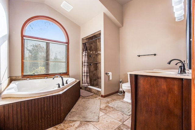 full bathroom featuring toilet, vanity, vaulted ceiling, and separate shower and tub